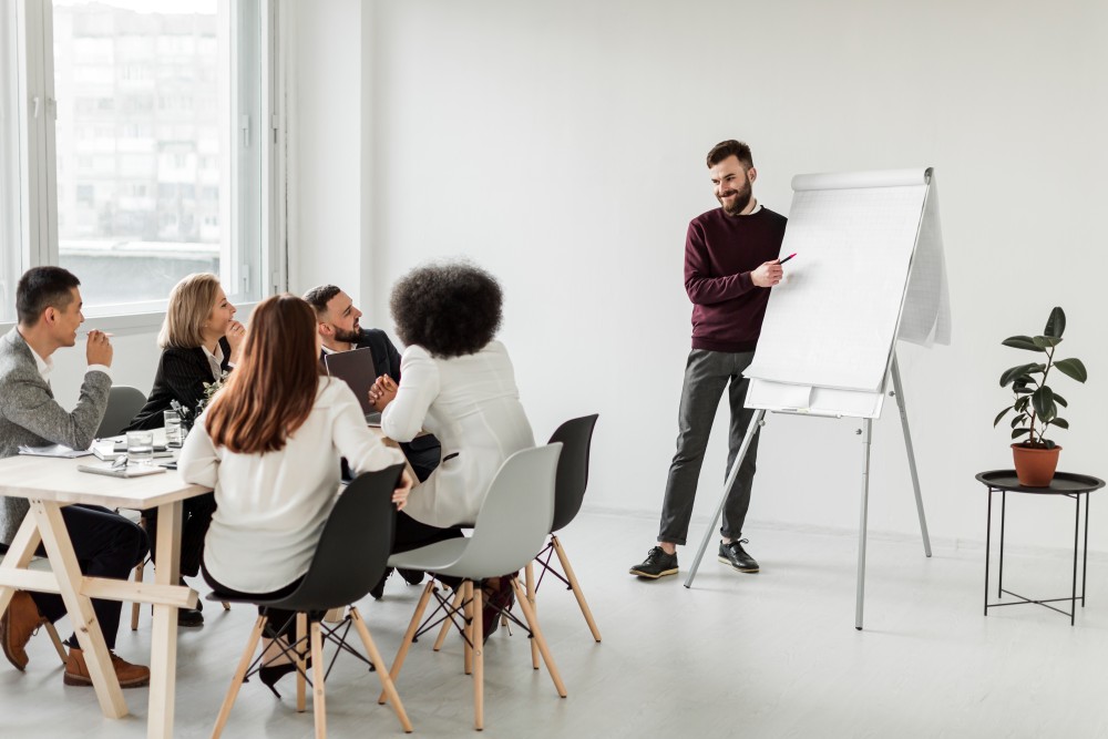 business employees meeting while taking notes