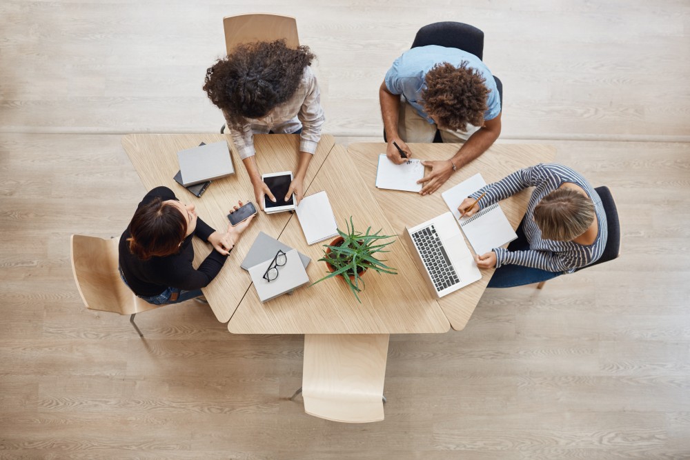 employees having meeting in the meeting room